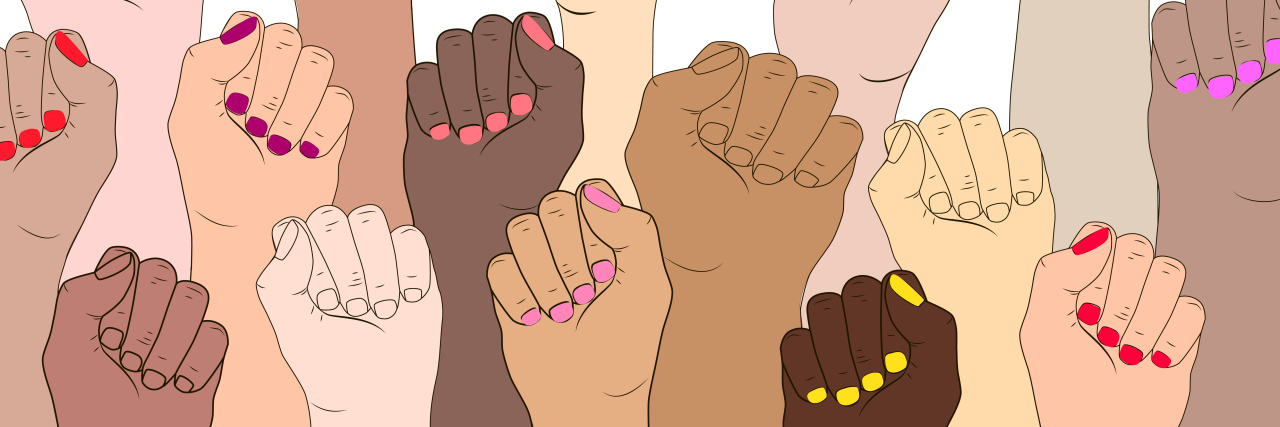 Why I Proudly Call Myself a Crip, Queer Feminist Female hands of diverse skin tones raised in fists.