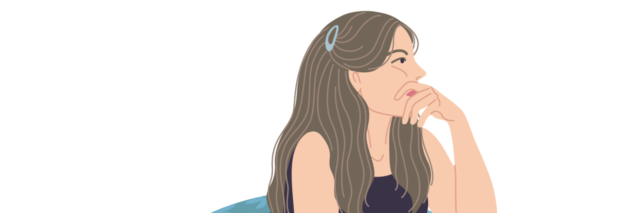 Who Would I Be Without Autism? Woman sitting in armchair thinking.