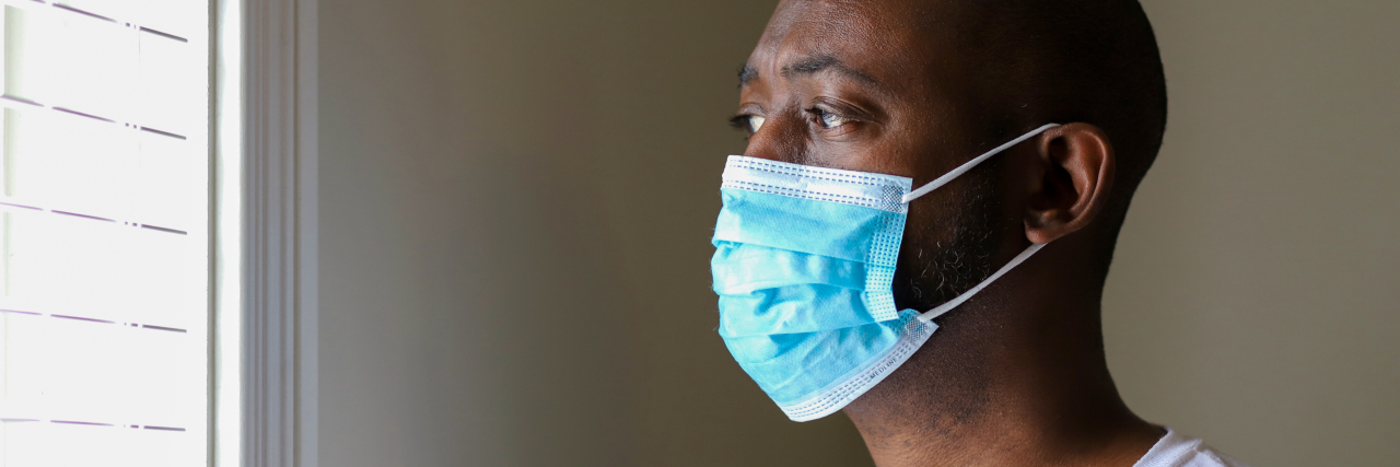 KHN: Black Americans Are Getting Vaccinated at Lower Rates Black man wearing a mask