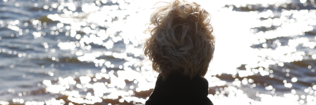 When Multiple Myeloma Makes Me Ask 'Why Me' a woman overlooking a river