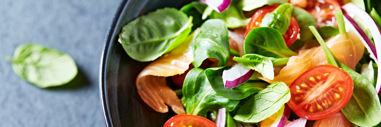 The 'Healthy' Advice That Could Harm People With MCAS Vegetable salad with smoked salmon.