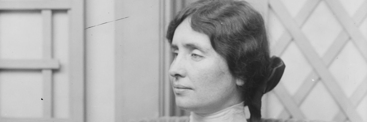 Yes, Gen Z, Helen Keller Was a Real Person Black and white photo of Helen Keller in middle age with her hair in a bun, shown in profile.