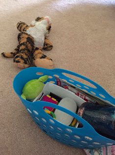 My son's sensory bin and Tiegie he brought to help calm my brain