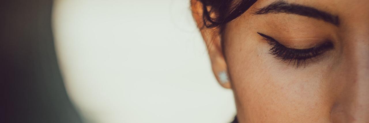 A Letter to the Boy Who Hurt Me A woman looking down