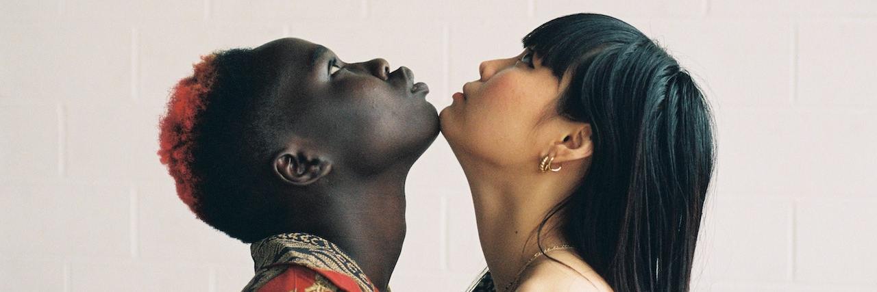 A Letter to Share With Your Flaky Friend Two people, chin to chin, looking up