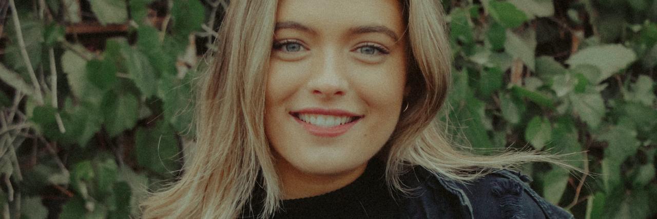 Hidden Depression When You Secretly Want To Die photo of woman smiling into camera