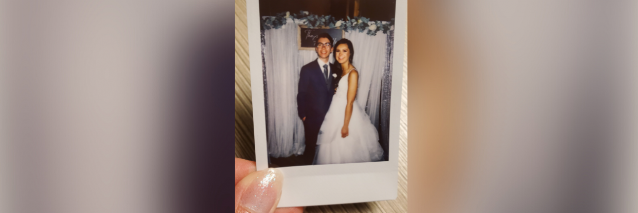 Polaroid of contributor and her husband on their wedding day
