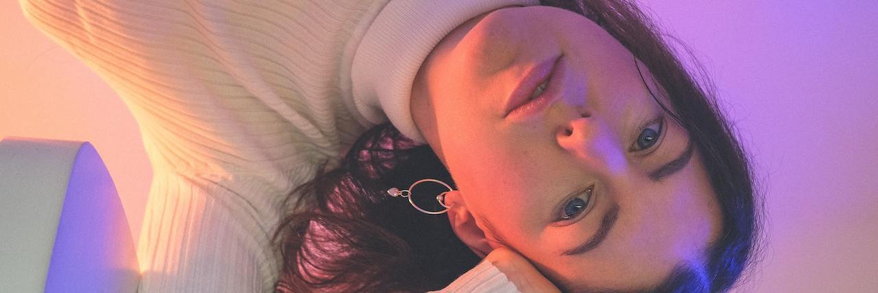 Why It's Important to Open Up About Sexual Assault A woman looking at the camera