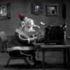 Max from "Mary and Max" using his typewriter.