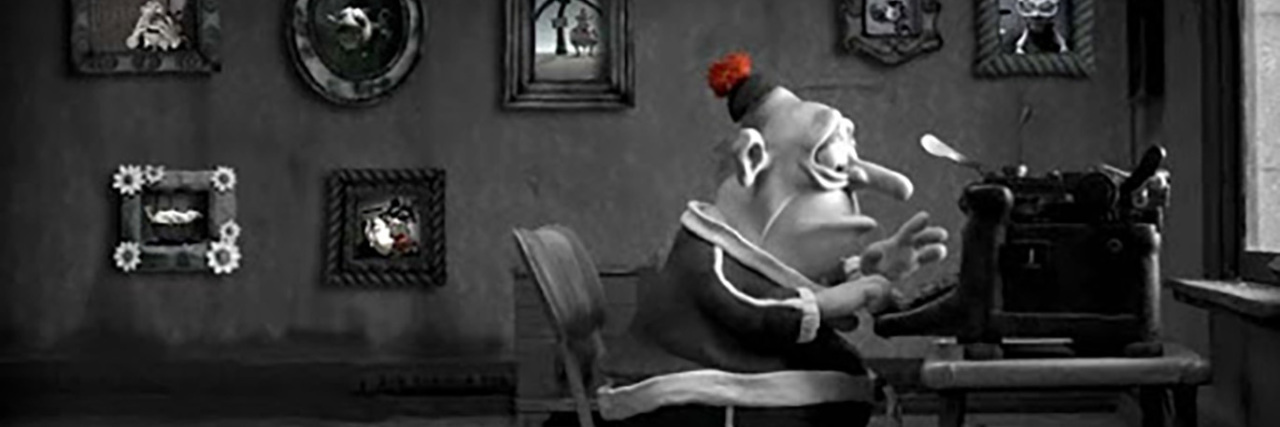 Max from "Mary and Max" using his typewriter.