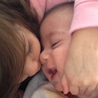 Jaclyn's daughter embracing her son.