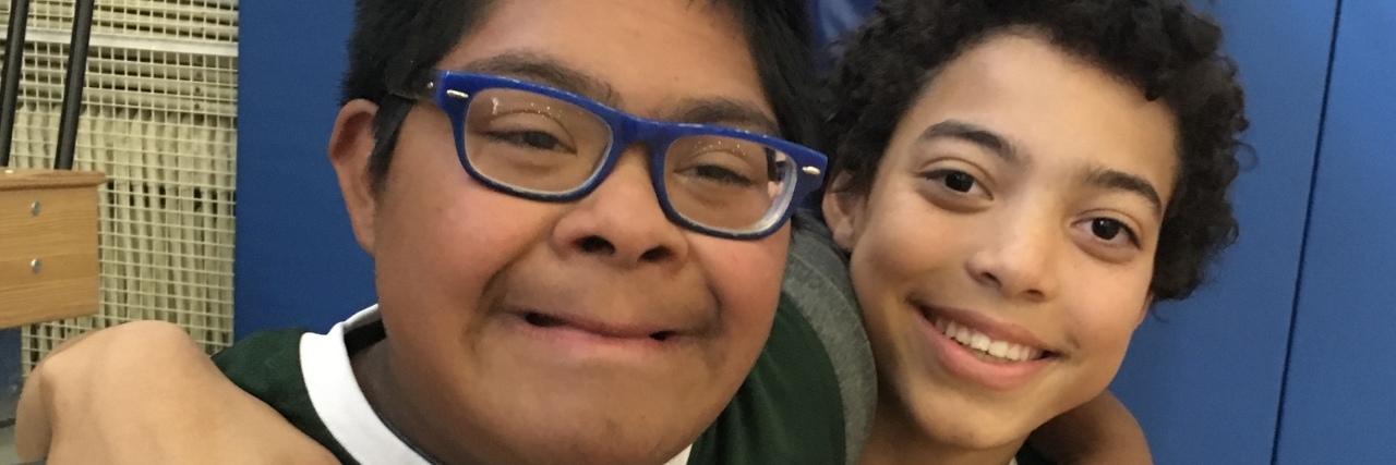 Encouraging Teachers to See My Son With Down Syndrome's Talents Michelle's son wearing a Celtics jersey.