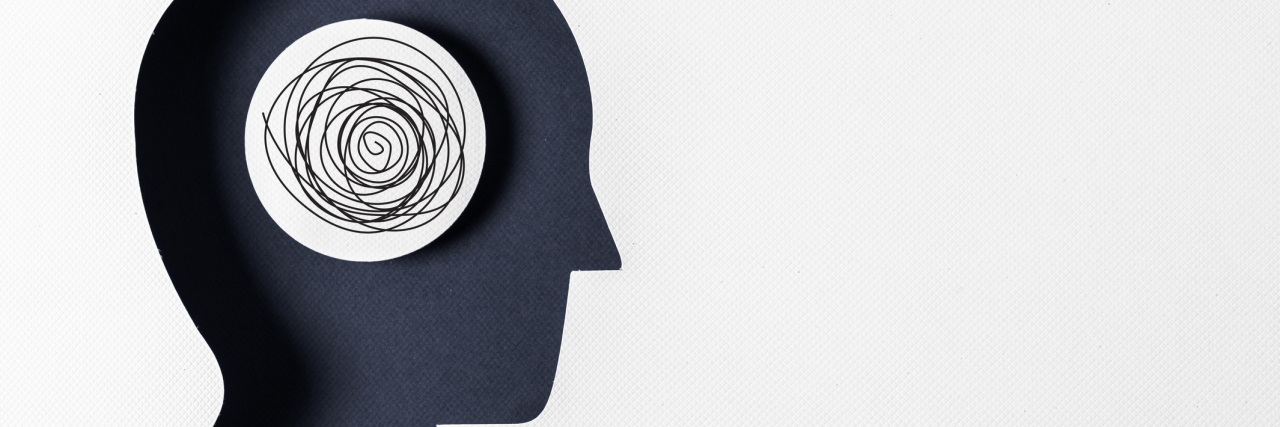 Thoughts After My Recent Borderline Personality Disorder Diagnosis Side profile silhouette of a face with a white circle that has black scribbles on it inside