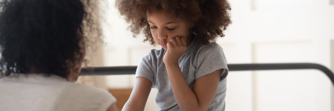 New WHO Guidelines Address Childhood Chronic Pain mother holds hand of sad little daughter