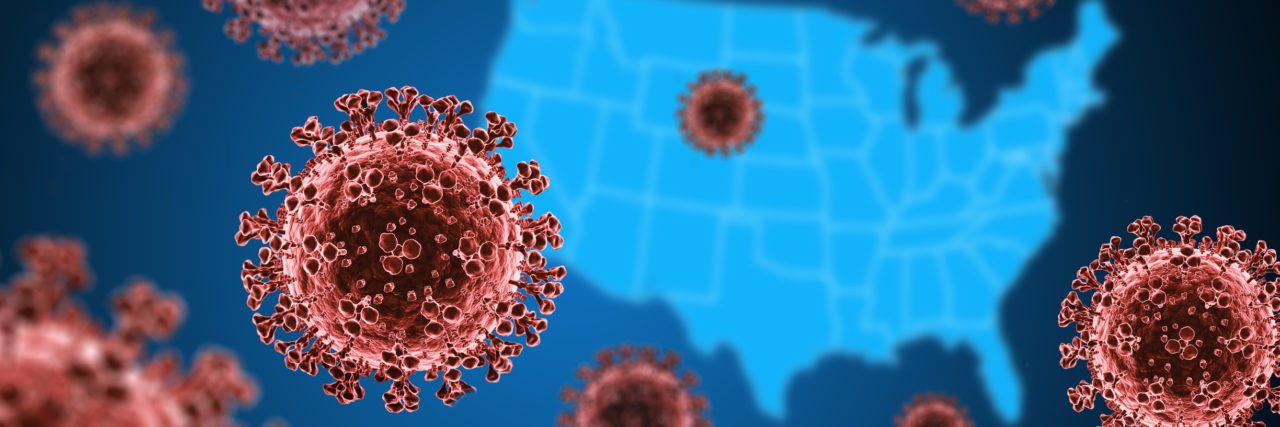 Graphic depiction of red SARS-CoV-2 cells in front of a blue map of the U.S.
