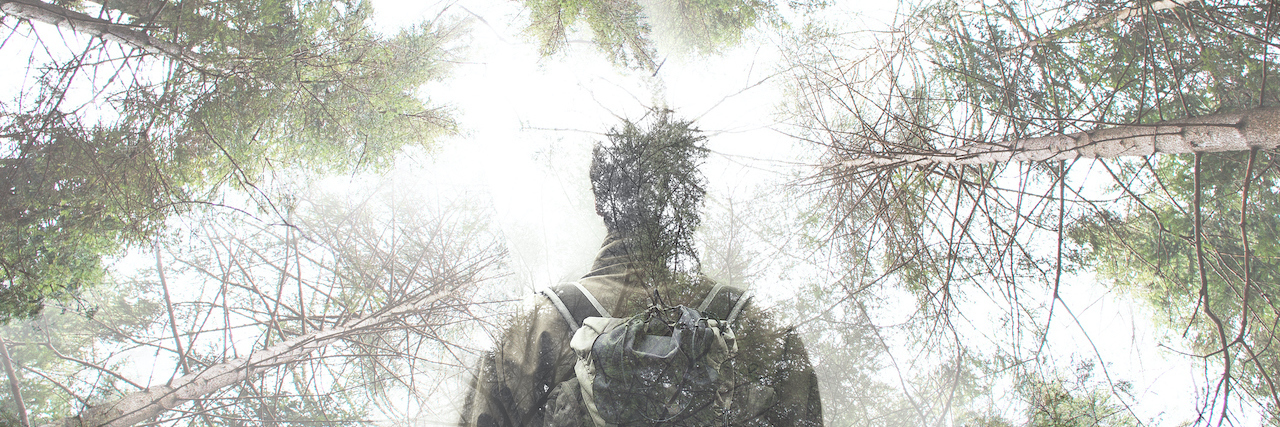 My Bipolar Disorder Diagnosis Helps Me Better Understand Who I Am Double exposure of hiker walking in a mystic forest