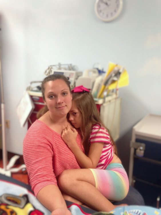 Lori and her daughter comforting each other on a tough day.