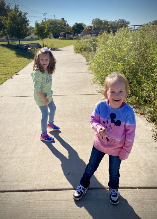 Shelby and Hadley playing outside.