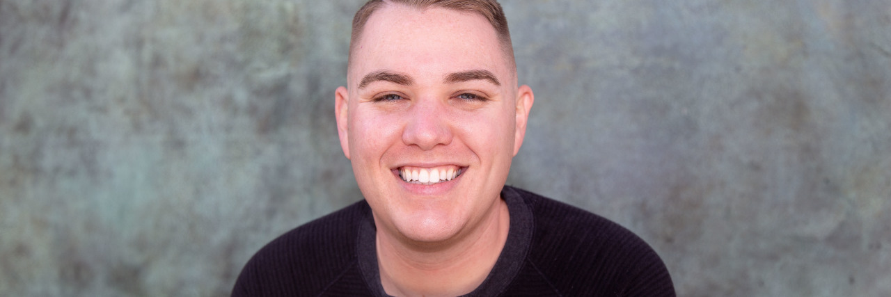 How I Befriended and Then Said Goodbye to My Anxiety photo of the contributor posing and smiling for the camera