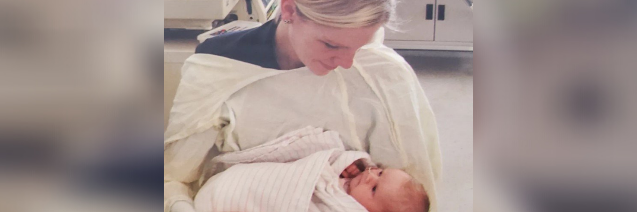 Jaime holding Callie as a baby.