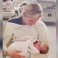 Jaime holding Callie as a baby.