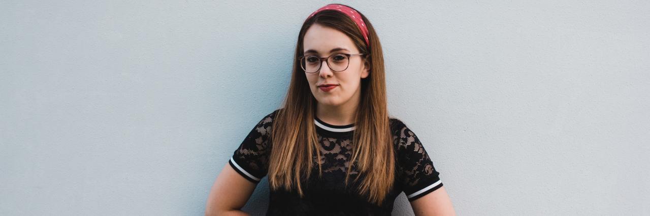 People With Chronic Illness 'Stay Strong' Because We Choose to Fight Girl standing against a white background