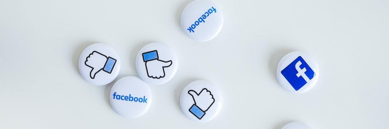 Collection of buttons with the Facebook logo on them against a white background