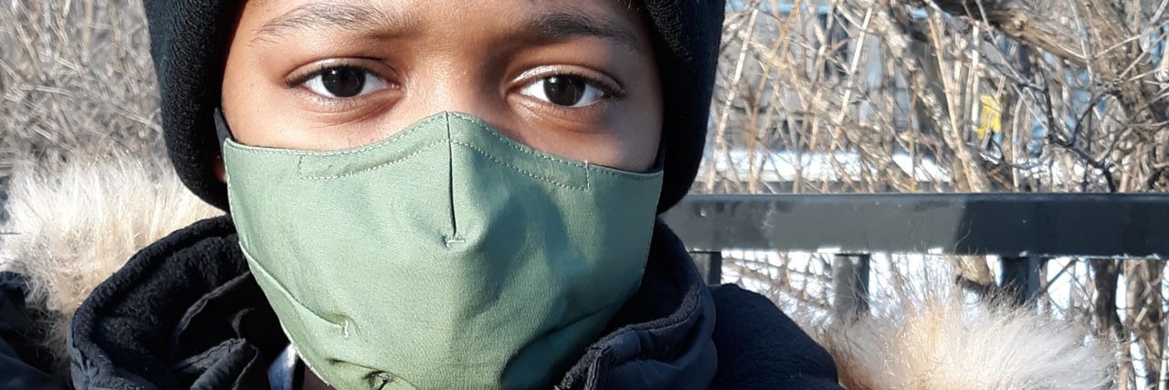 My Son With Autism Tested the Rafi Nova Sensory Mask Chanel's son wearing Rafi Nova Mask