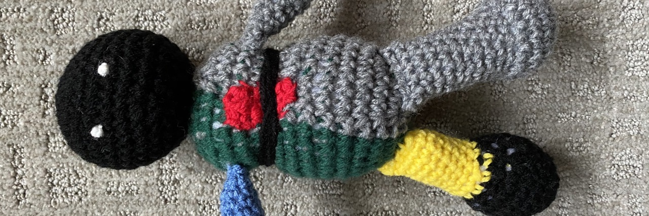 How I Experience Anxiety With Cerebral Palsy This image depicts the front view of crocheted Ares.