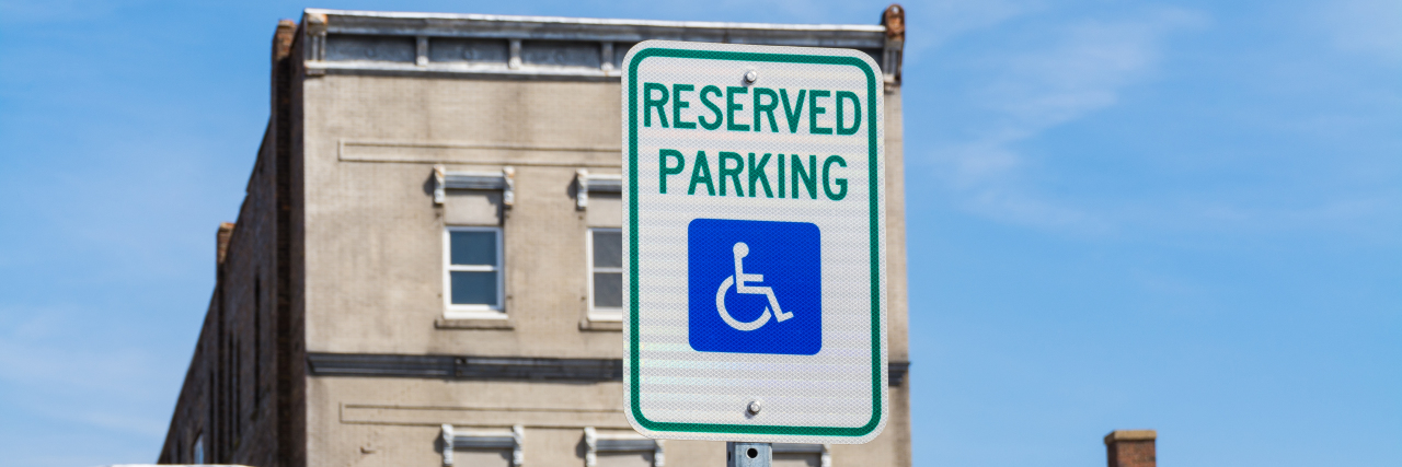 The Abuse of Disability Parking Needs to Stop Reserved parking for disabled street sign