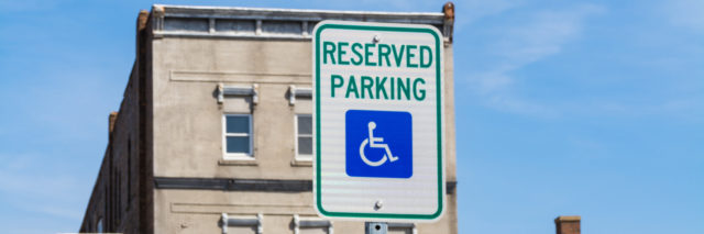 Reserved parking for disabled street sign