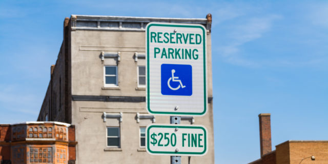 Reserved parking for disabled street sign