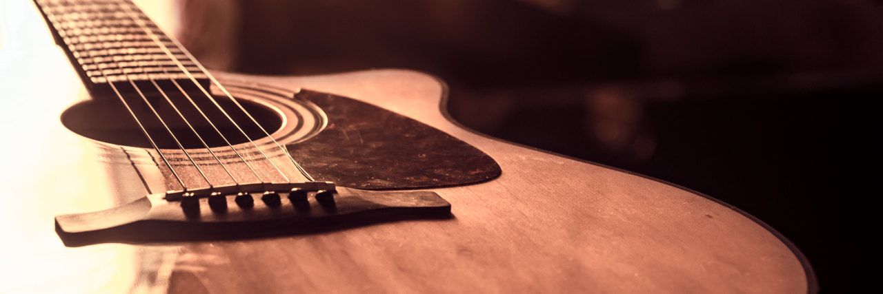 What a Guitar Taught Me About Multiple Sclerosis and Changing Plans Acoustic guitar close-up