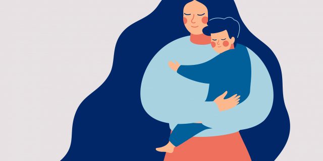 Young mother holds her son.
