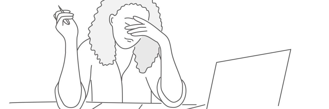 How Ableism Contributed to Me Leaving Graduate School Tired or stressed woman at desk.