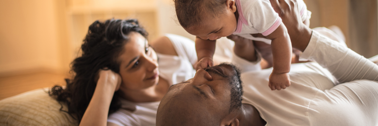 African-American parents with baby.