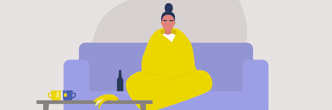 Illustration of woman sitting on a couch and wrapped in a blanket