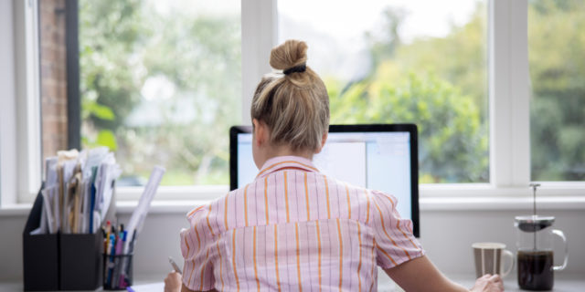 Woman Working From Home On Computer
