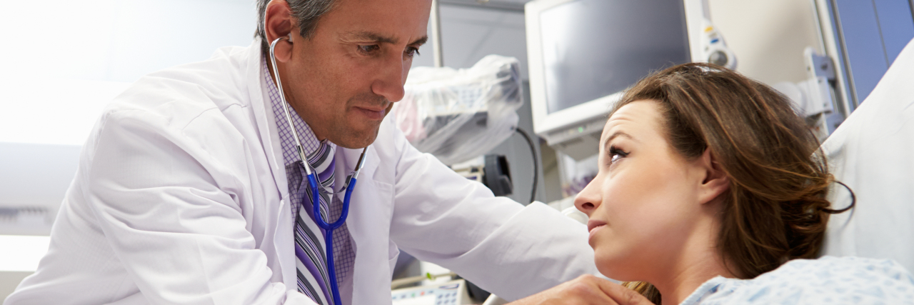 Navigating the Adult Healthcare System With Congenital Heart Disease Emergency room doctor examining woman