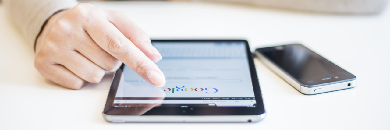 Follow the Doctor Not the Hospital woman holding an ipad