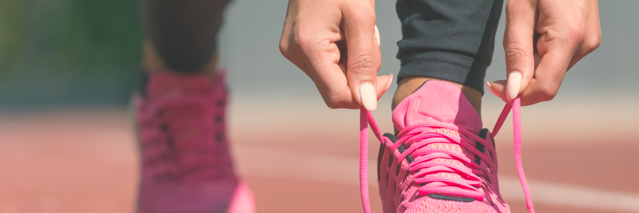 How My Learning Disabilities Affect My Hand Dexterity Woman tying laces of running shoes.