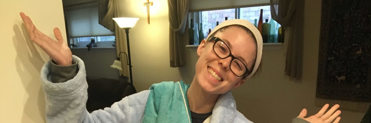 Tell Me You Have a Chronic Illness Without Telling Me Casey looking comfy in her bathrobe.