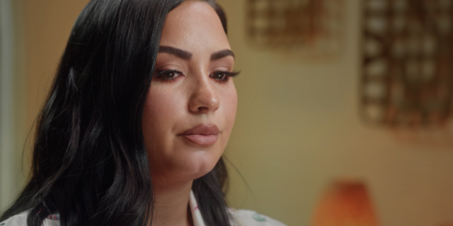 Watching Demi Lovato's Docuseries #MeToo Reveal as a Trauma Survivor screenshot from Demi Lovato's docuseries "Dancing With The Devil" episode 3, "Reclaiming Power," when she is talking about trauma