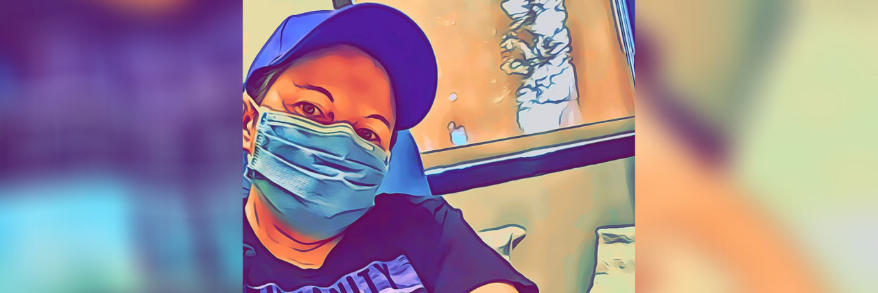 3 Things to Know About Those at High Risk for Severe COVID-19 Katy wearing a mask at the hospital getting an infusion.