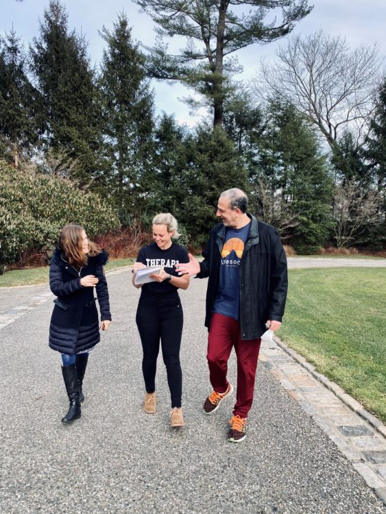 Photo of Melissa and Doug founders, walking with contributor 