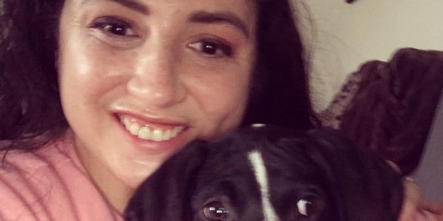 What It Means to Fight for a Label You Don't Even Want Contributor smiling with her dog