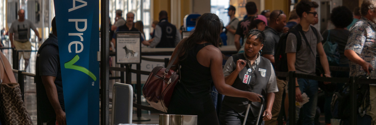 TSA To Improve Screenings for Disabled Travelers TSA Precheck and Global Entry line at security checkpoint at Reagan National Airport