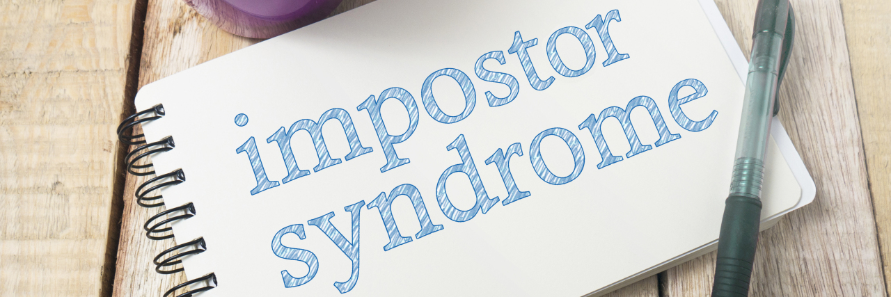 Notebook that says "imposter syndrome"