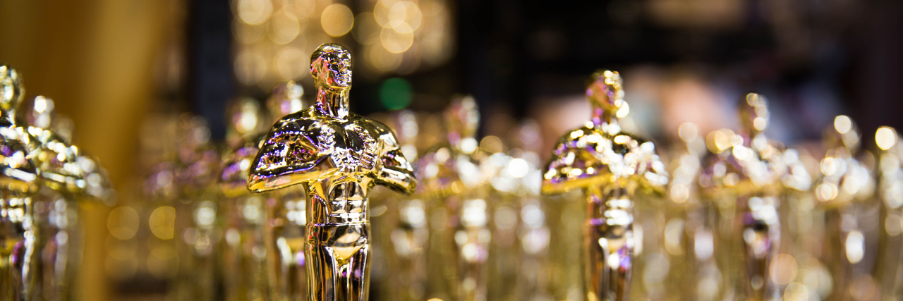 Oscar awards on a table.