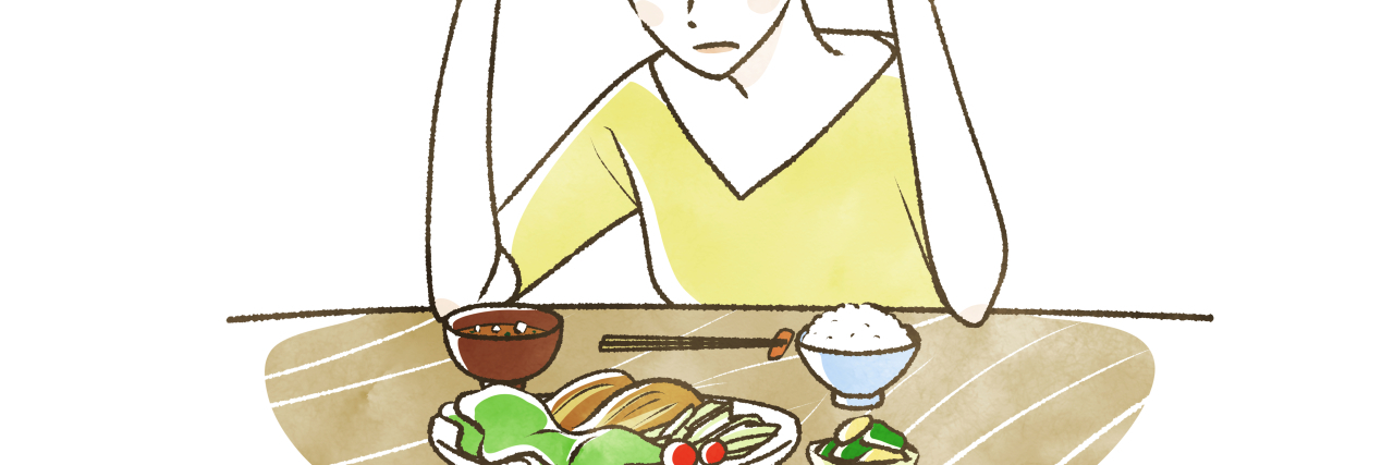 Why Eating in Front of Others is Hard For People With Eating Disorders person staring at food